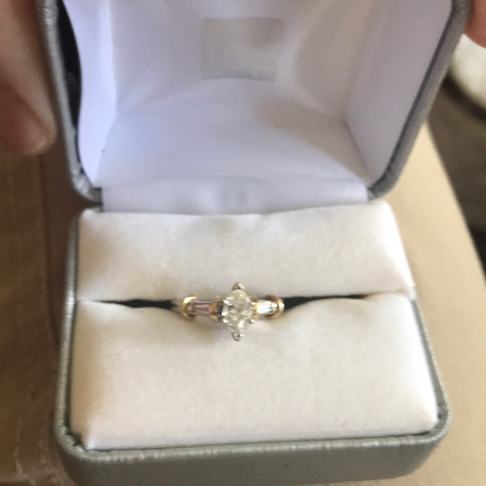 3/4 k Diamond with two side diamonds, 14k gold vintage engagement ring.